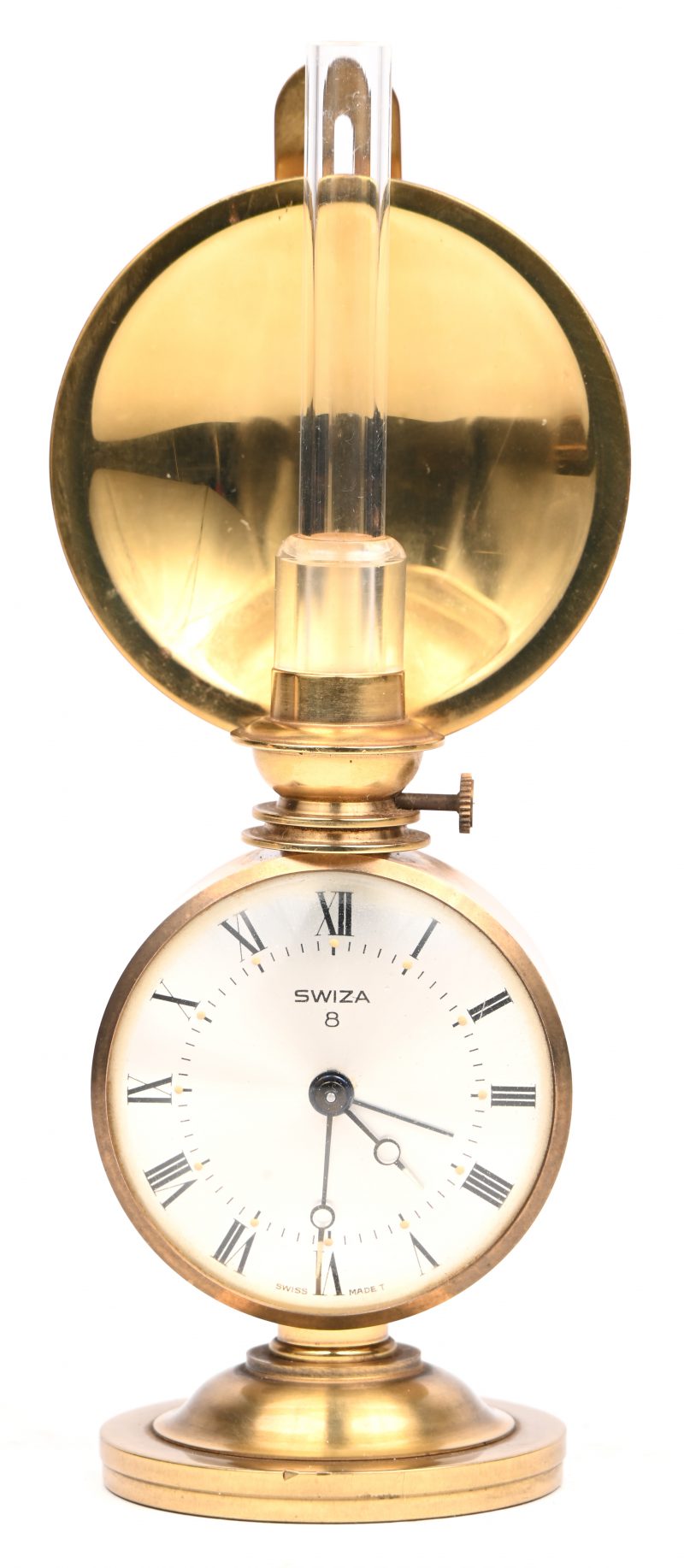 Een vintage Swiza 8-dagen klokje in de vorm van een olielampje.