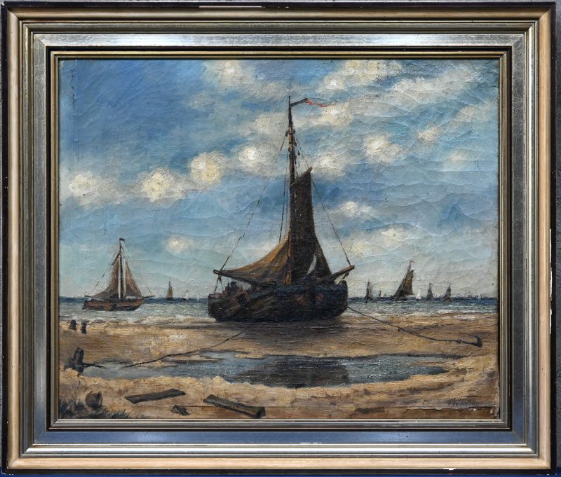Een maritiem schilderij gesigneerd V. Waning, met boten op het droge .