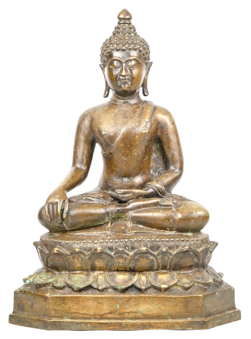 Een brons gegoten Boeddha beeld.