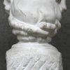 “Oudere dame”, een gesculpteerde buste in carrara marmer, gesigneerd Koos Van Der Kaaij en gedateerd 1942.