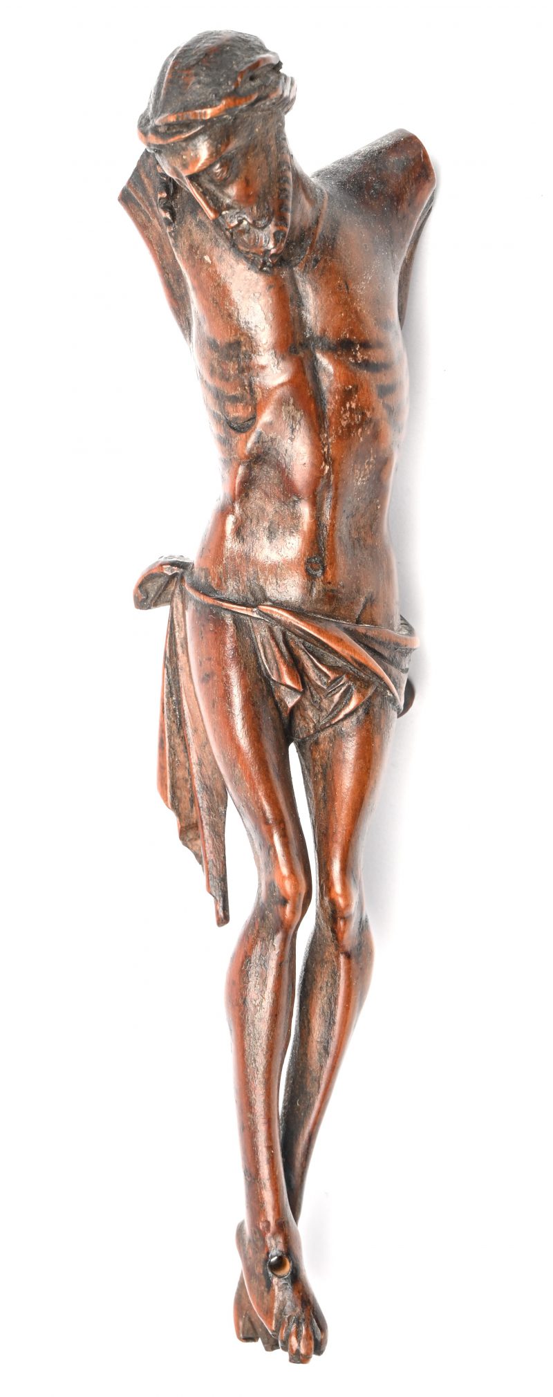 Een uit perenhout gesculpteerd Corpus Christi beeldje. Armen manco. Eind 17e - begin 18e eeuw. Afkomst antiquair Maes Roger, Antwerpen