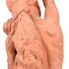 Een buste in terracotta van een jongedame met lange lokken. Gesigneerd Koos Van Der Kaay en gedateerd 1950.