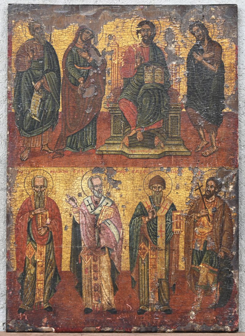 “Christus omringd door 7 heiligen”. Een geschilderd icoon met sporen van sleet.