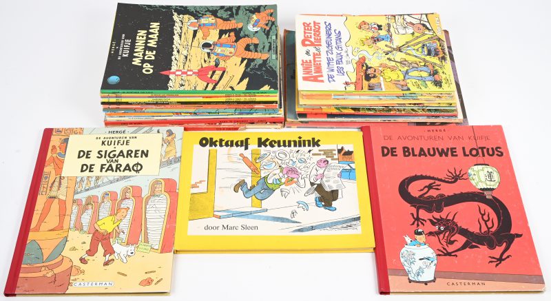 Een lot strips, allerlei; waaronder Nero, Oktaaf Keunink, Kuifje, en wat modernere heruitgaven.