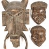 Een lot varia Afrikaanse items, bestaande uit een houten beeldje, stenen beeldje, 2 houten gelaten wanddeco en een masker.