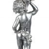 Een kunstbronzen putto kandelaar.