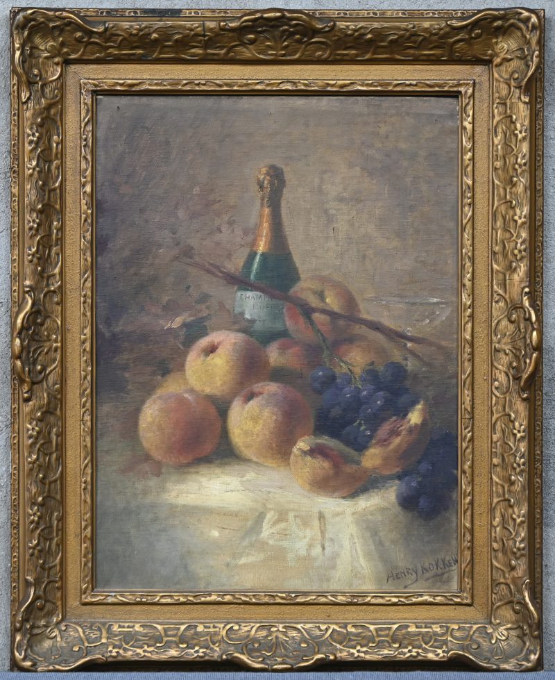 “Stilleven met fruit en ongeopende Champagnefles”, een schilderij, olieverf op doek, gesigneerd Henry Kokken.