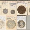 Een lot van 32 munten uit Zuid-Afrika. Kruger 2,5 Sh. 1897, 2 Sh. 1896 & 1897, 1 Sh. 1897, alle Ag 925/1000, en 4 kleinere waarden. George V, 2,5 Sh. 1923, 1930, 1936, Florin 1923, 2 Sh. 1933, 1 Sh. 1923 (”Zuid”, “1”), 1930 (”Zuid” , “1”), 1936 (”Suid”, Shilling” en 1 kleinere waarden.