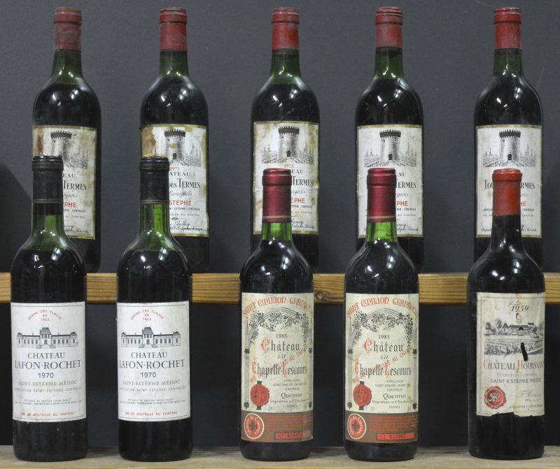 Lot rode bordeaux        aantal: 10 bt    Ch. Houissant A.C. St-Estèphe Cru bourgeois    1959  aantal: 1 bt vts   Ch. Lafon-Rochet A.C. St-Estèphe 4e grand cru classé  M.C.  1970  aantal: 2 bt ms   Ch. Tour des Termes A.C. St-Estèphe Cru bourgeois  M.C.  1973  aantal: 5 bt ts   Ch. La Chapelle-Lescours A.C. St-Emilion grand cru   M.C.  1983  aantal: 2 bt bn