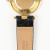 Een 18 kt geelgouden dameshorloge met lederen polsband.