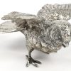 Een lot van 4 zilveren dieren, gemerkt 925, bestaande uit een konijn, een everzwijn, een kuiken en een fazant als zoutstrooier. Totaalgewicht 340 gram.