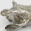 Een lot van 4 zilveren dieren, gemerkt 925, bestaande uit een konijn, een everzwijn, een kuiken en een fazant als zoutstrooier. Totaalgewicht 340 gram.