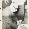 Lederen album uitgegeven door GROUPE 38, Telexpo 58. Bevat 22 bladzijden in ringmap en 4 losse vellen met handtekeningen. Waaronder deze van Leopold III en Boudewijn met een foto waarop ze het boek signeren. Verder een groot lot foto’s en een singeltje aangeboden door Marie thumas met een rede van de toenmalige Koning Boudewijn.