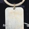 Een zilveren sleutelhanger, als geschenk aan de passagiers van dit legendarische vliegtuig, gemerkt 925, 25 gram.