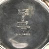 Een koffie-en theeservies van Sheffield plate. Koffie-en theepot, suiker-en melkpot en dienblad (onderaan gemerkt. We voegen er twaalf art deco ontbijtmessen aan toe met zilveren heften.