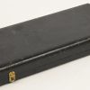 Set van 12 zilveren lepeltjes en een suikertang. 800/1000. Gemerkt met een haan en de letter P. In casette, gemerkt; F. Peeters, Malines. 245 gram.