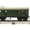 Een elektrische Märklin treinset uit 1936, spoor O, bestaande uit een elektrische locomotief, CS 66/12920, 6 wagons, 18520, 17540, 17910, 17610, 17640 en een herschilderde goederenwagon (nr onbekend), en een uitgebreid lot sporen en de bijhorende transformator.