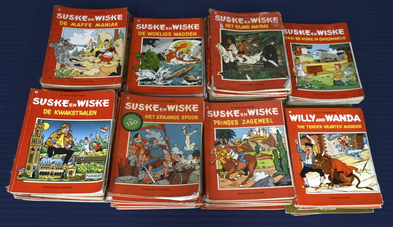 Suske en Wiske. Gekleurde rode reeks. 125 albums, sommige versleten, andere goed gelezen, enkele zeer goede staat. Enkele dubbele exemplaren, tussen nummers 68 en 245. Ed. Standaard Uitgeverij. Plus het boek Suske en Wiske 25 jaar, een jaarboek en enkele reclame-uitgaven.