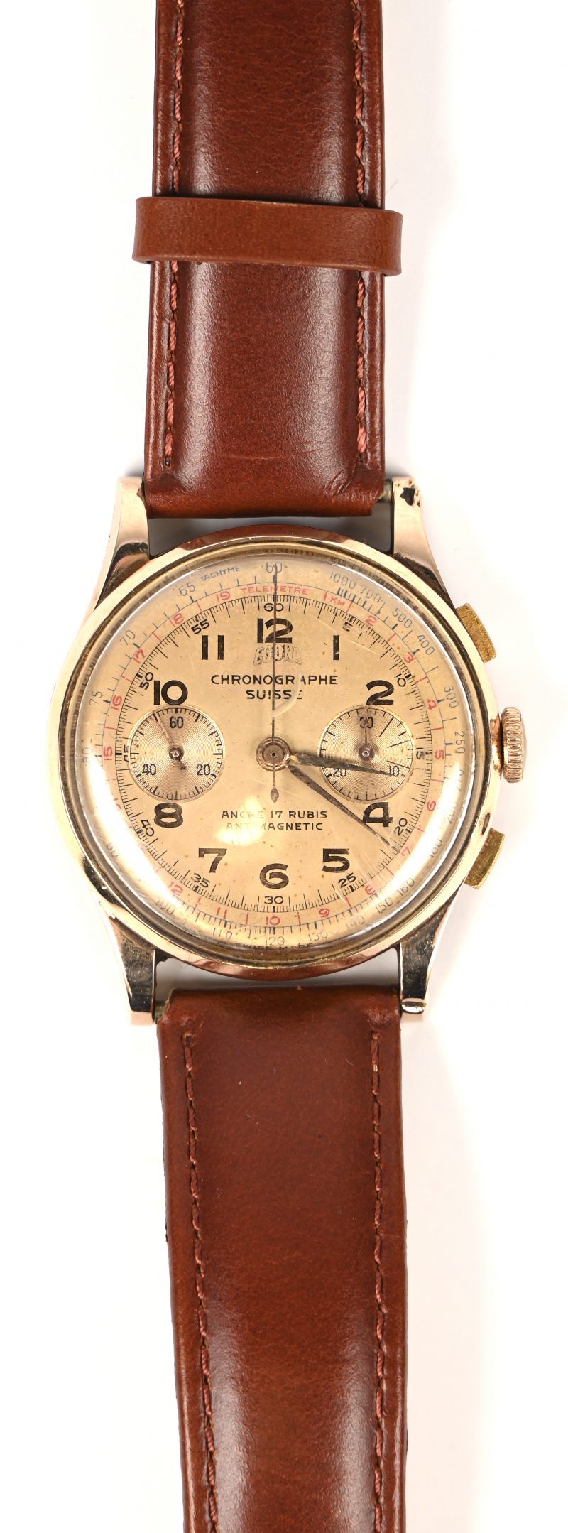 Een herenhorloge met 18 kt geelgoud bezel en achterkant van verguld metaal en met lederen polsband.