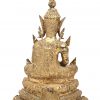 Een verguld metalen gezeten Buddhabeeld, deel van een tafellamp. Thais werk.