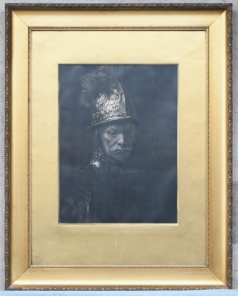 Een oude goudkleurige kader met een foto-lithografische reproductie naar ‘De Man Met De Gouden Helm’. Binnenmaat; 75/56 cm