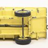 Een lot van vier oude Dinky Toys voertuigen en aanhangers. Farmtrailer nr. 27B, aanhangwagen nr. 341, Euclid rear dump truck nr. 965 en een herschilderde Vanguard personenwagen.