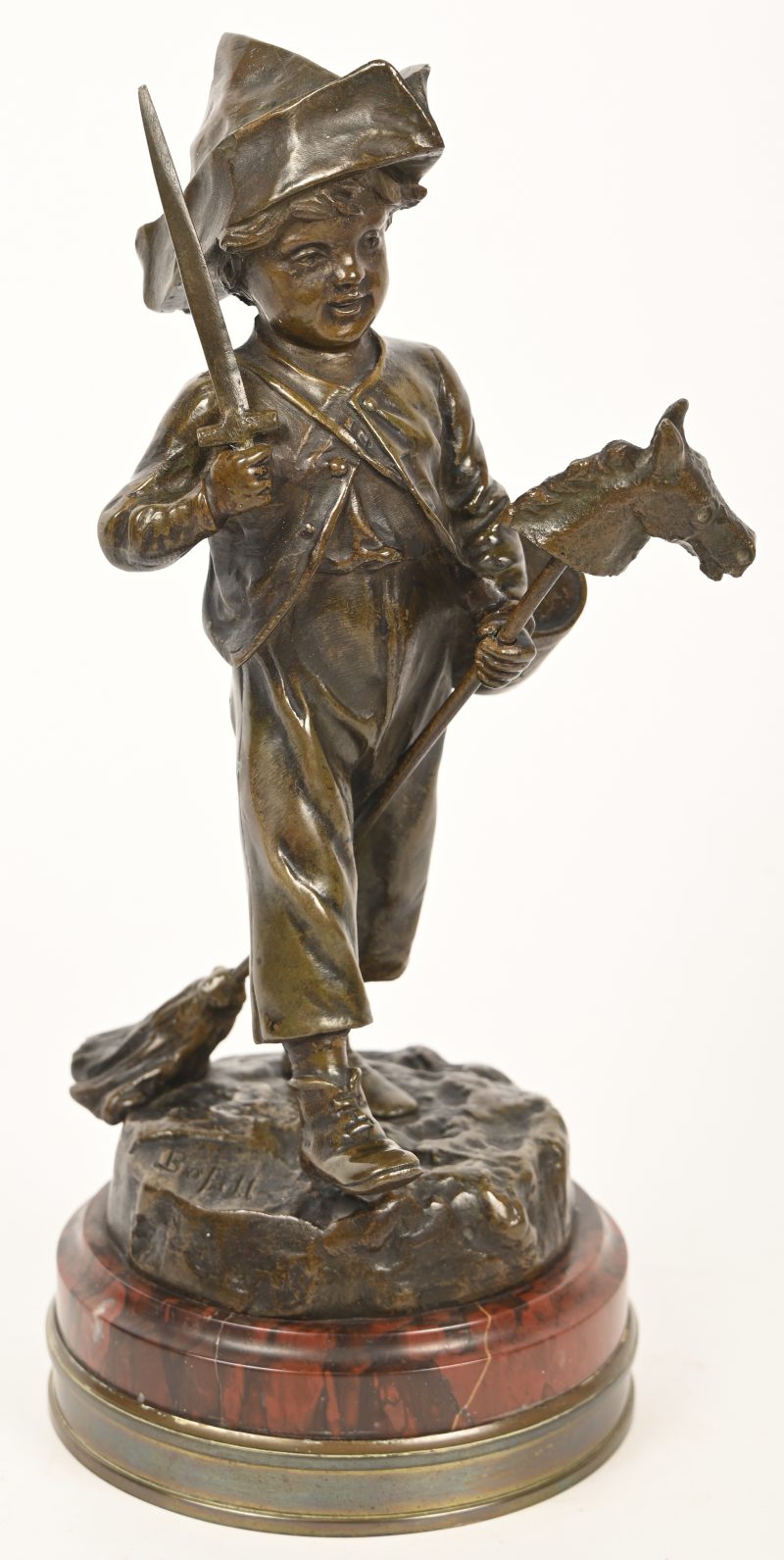 “De jonge trommelaar”, een bronzen beeldje op een sokkel van marmer en koper. Gesigneerd Bofill.