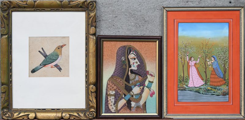 Een lot van drie werkjes uit Indïe, een eglomisé van een jonge dame in ornaat, een gouache met twee dames tussen de lentebloesems en een vogeltje op een tak.
