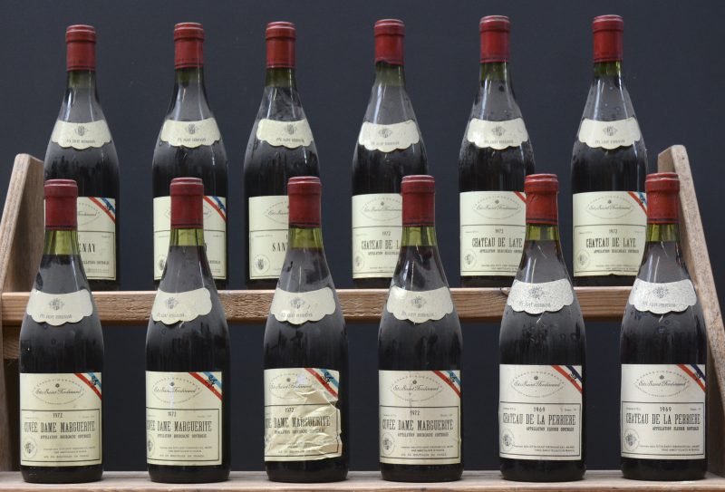 Lot rode wijn        aantal: 12 bt    Cuvée Dame Marguerite A.C. Bourgogne  Ets St Ferdinand, Milano M.O.  1972  aantal: 4 bt    Ch. de la Perrière A.C. Fleurie  Ets St Ferdinand, Milano M.O.  1969  aantal: 2 bt    Santenay A.C.  Ets St Ferdinand, Milano M.O.  1967  aantal: 3 bt    Ch. de Laye A.C. Beaujolais  Ets St Ferdinand, Milano M.O.  1972  aantal: 3 bt