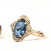 Een lot zilveren juwelen waaronder een armband, ketting, hanger, drie ringen bezet met half edelstenen en en camee.