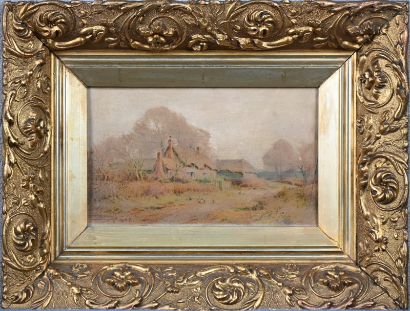 Een rijkelijk versierd goudkleurig kadertje met een binnenmaat van 17/27 cm.