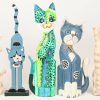 Een lot van 15 gesculpteerde houten katten, in diverse kleuren beschilderd.