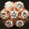 Een 18 kt roosgouden ring bezet met old-cut diamanten met gezamenlijk gewicht van 0,98 ct.