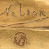 “Melkmeisje”, een bronzen buste, achteraan gesigneerd ‘Nelson’.