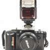 Een analoog fototoestel, Nikon F-401, te repareren (klep van filmrol sluit niet meer), met 2 lenzen: AF Nikkor 35-70mm - 1:3.3-4.5 en AF Nikkor 70-210mm - 1:4-5.6, flits, lichtmeter en tas met toebehoren.