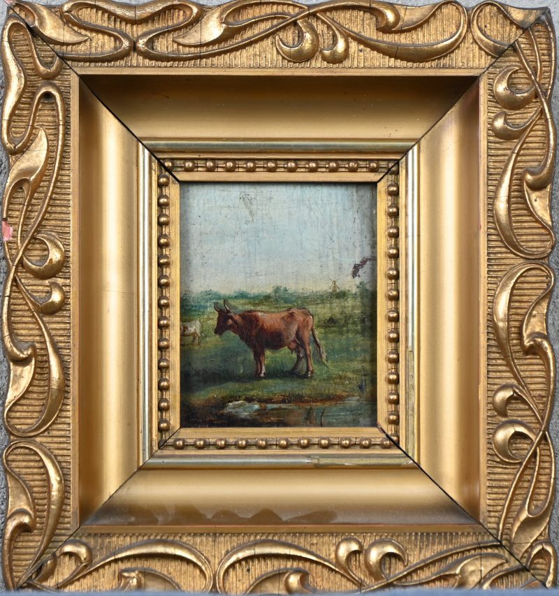 ‘Een landschapje met twee koeien en een windmolen’, olieverf op paneel. Niet getekend. In de stijl van de 19e eeuw.