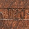 Een gesculpteerd houten beeldje van een bisschop. Gemaakt van een stuk hout van het oude dak van de kathedraal van Glasgow.
