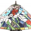 ‘De geliefden’, een grote tafellamp op een bronsgepatineerd zamac beeld. Op de voet getekend; Gaudez met op de voet een koperen plaatje verwijzend naar Mathurin Moreau. Met een glas in lood bloemenkap in de stijl van Tiffany.