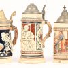 Een lot van tien bierpullen, Westerwald aardewerk. Acht pullen hebben een deksel, van 1 kruik is het oor manco.