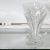 Een 59-delig kristallen glasservies, Val Saint Lambert, bestaande uit 12 stuks h 13.5 x Ø 10 cm, 12 stuks h 11 x Ø 8.5 cm (1 glas met schilfer), 12 stuks h 10 x Ø 8 cm, 12 stuks h 9 x Ø 7.5 cm en 11 groene, h 10 x Ø 8 cm.