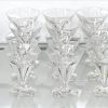 Een 59-delig kristallen glasservies, Val Saint Lambert, bestaande uit 12 stuks h 13.5 x Ø 10 cm, 12 stuks h 11 x Ø 8.5 cm (1 glas met schilfer), 12 stuks h 10 x Ø 8 cm, 12 stuks h 9 x Ø 7.5 cm en 11 groene, h 10 x Ø 8 cm.