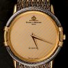 Een roestvrij stalen dameshorloge met gouden details. Quartz Swiss Made.