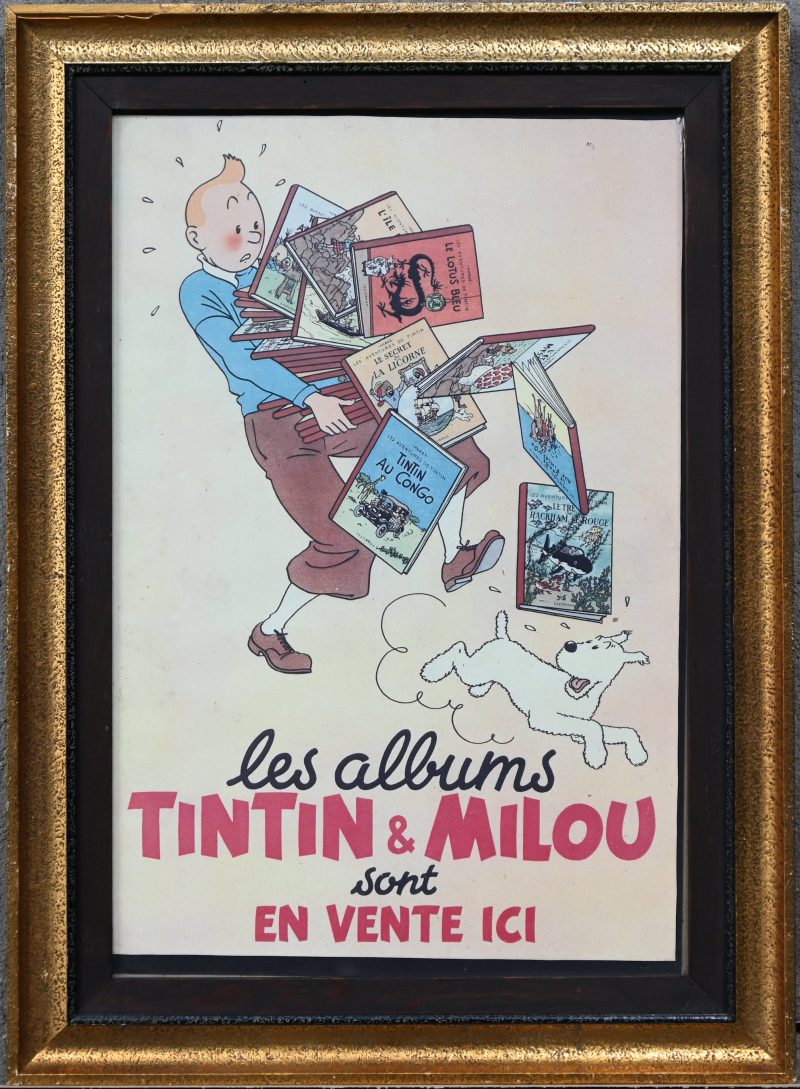 “Les albums Tintin & Milou sont en vente ici”, een kader met vintage reclameposter voor onze stripheld Kuifje.