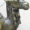 “Toearegkrijger op zijn dromedaris”. Bronzen beeld met groenbruin patina. Gesigneerd.