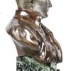 “Napoleon I”. Een bronzen borstbeeld met donkerbruin patina op groengeaderde marmeren basis. Gesigneerd.