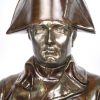 “Napoleon I”. Een bronzen borstbeeld met donkerbruin patina op groengeaderde marmeren basis. Gesigneerd.