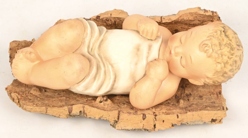 “Jezus in een kribbe van kurk”. Polychroom porselein. Gemerkt Goebbel en in oorspronkelijke doos.