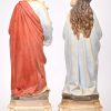 “Madonna en kind” en “Sint-Jozef”. Twee beeldjes vanpolychroom biscuit en porselein. Mogelijk Brussel begin XXste eeuw.