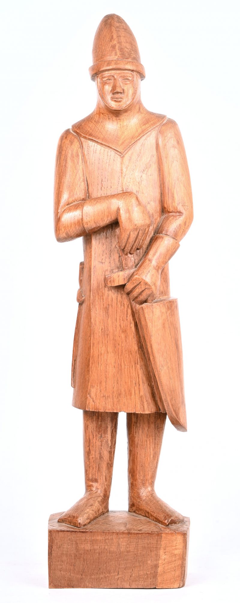 Een gesculpteerd eikenhouten beeld van “Jefke - de gemeentenaar”, gebaseerd op een middeleeuwse soldaat, symbool van het Gemeentekrediet. Gesigneerd.