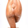 Een gesculpteerd houten damestorso, niet gesigneerd.